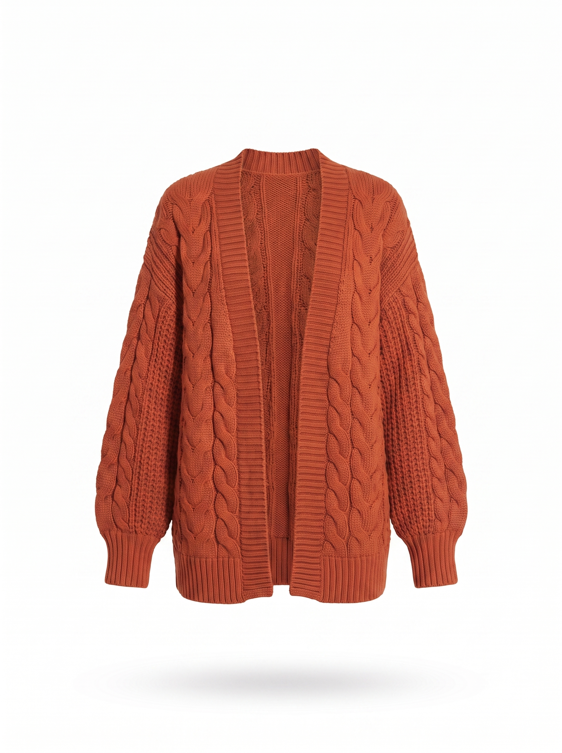 Chunky cable knit cardigan on a white background