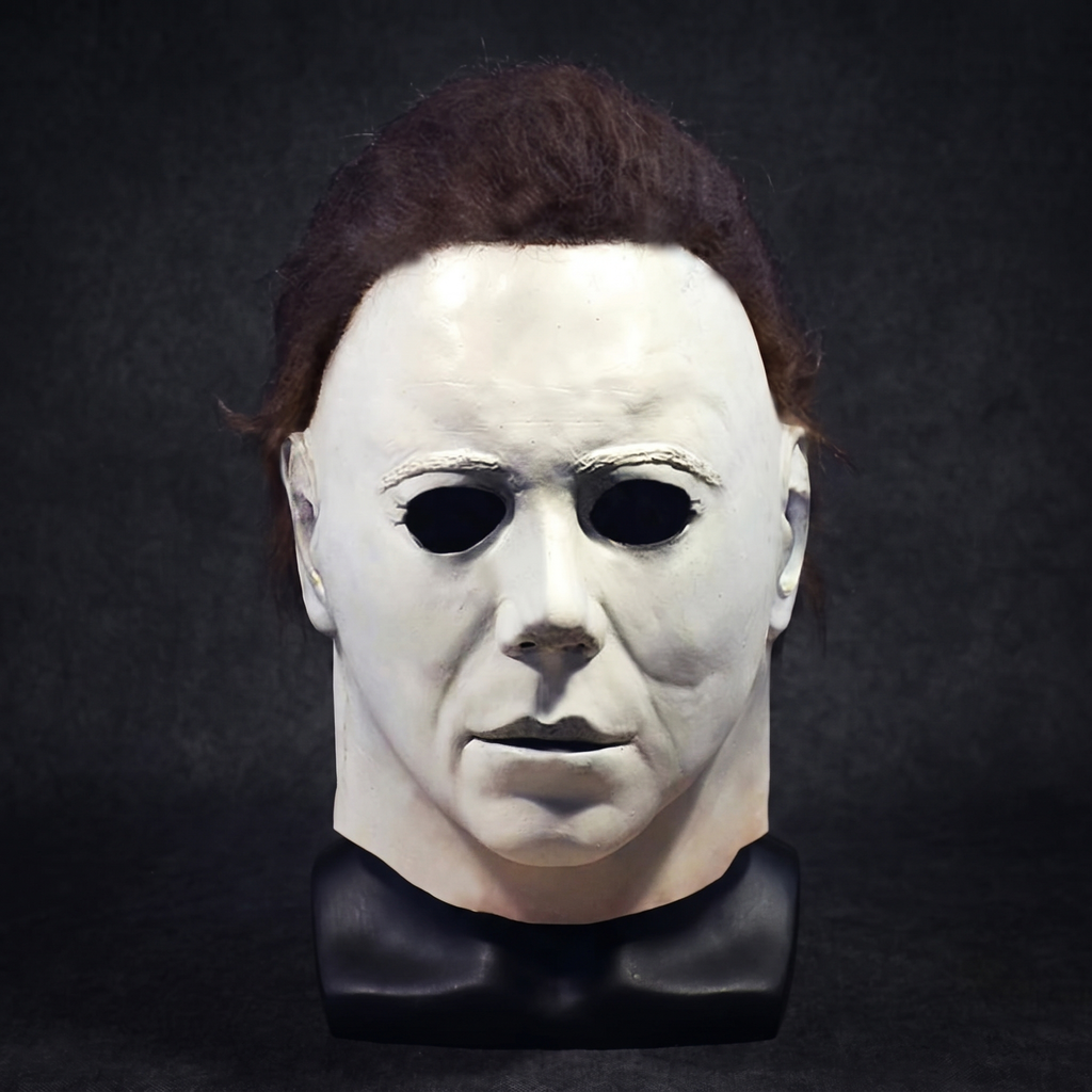Latex horror mask displayed on a black mannequin head stand