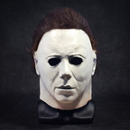 Latex horror mask displayed on a black mannequin head stand