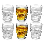 Clear skull shot glasses arranged in a group