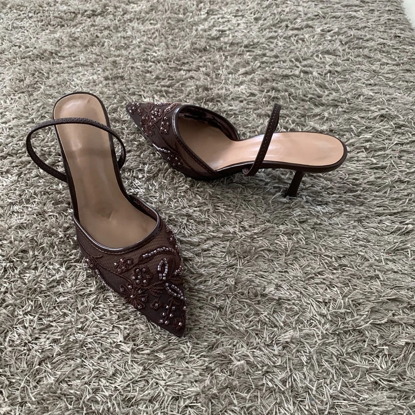 Pointed toe slingback pump, angled view