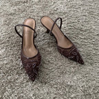 Pointed toe slingback pump, pair front view