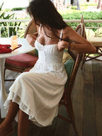 Smocked bodice and strap detail on the midi dress