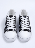 Lace-up sneakers on a white background