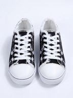 Lace-up sneakers on a white background