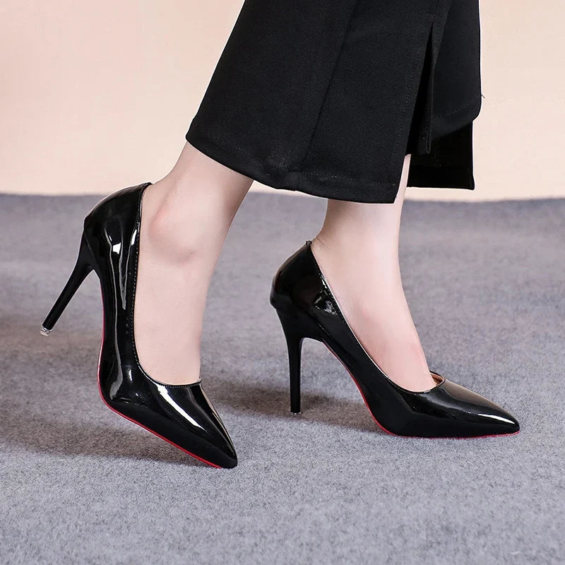 Pointed toe stiletto pump, worn on foot