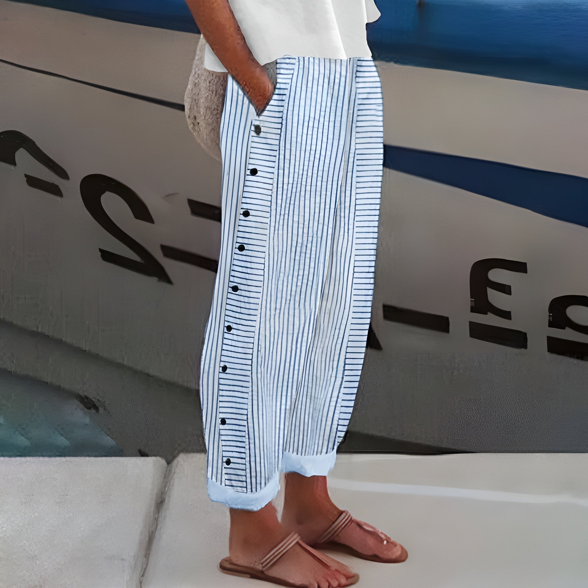 Striped tapered ankle pants in blue