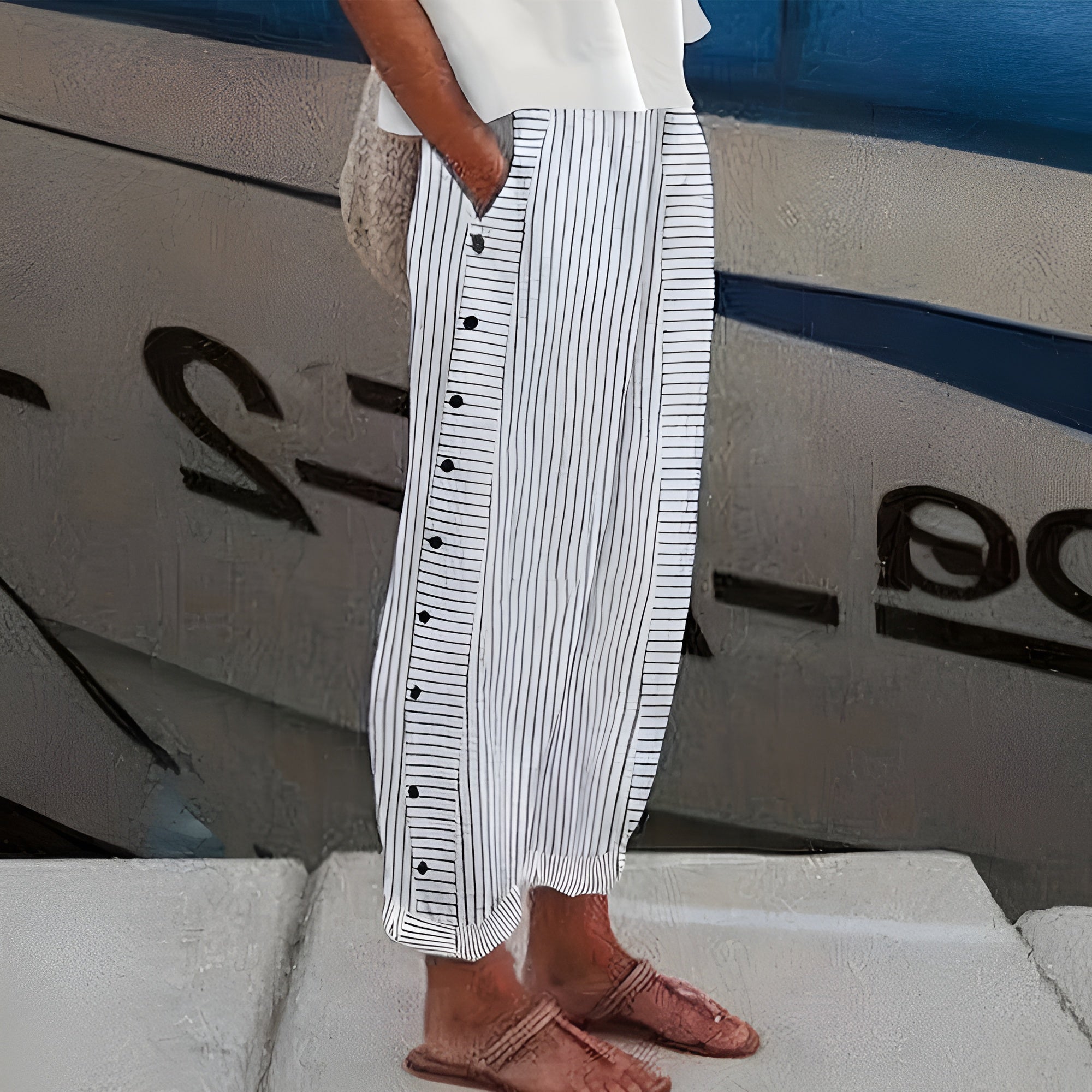 Striped tapered ankle pants in gray