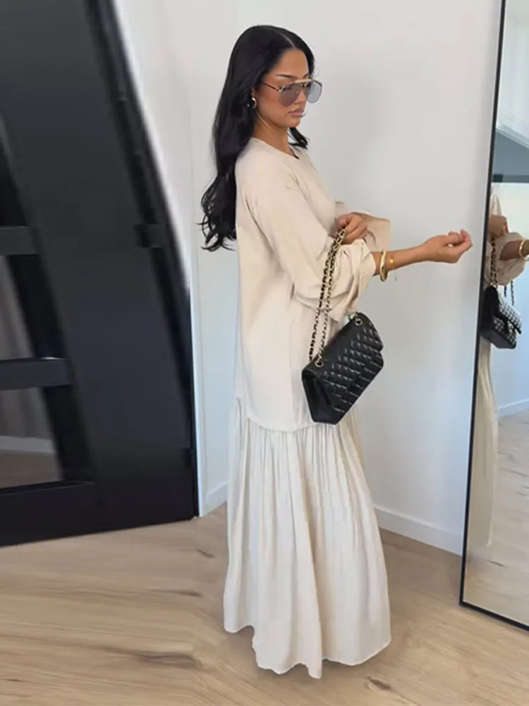 Tiered maxi dress, side view showing the sleeve drape