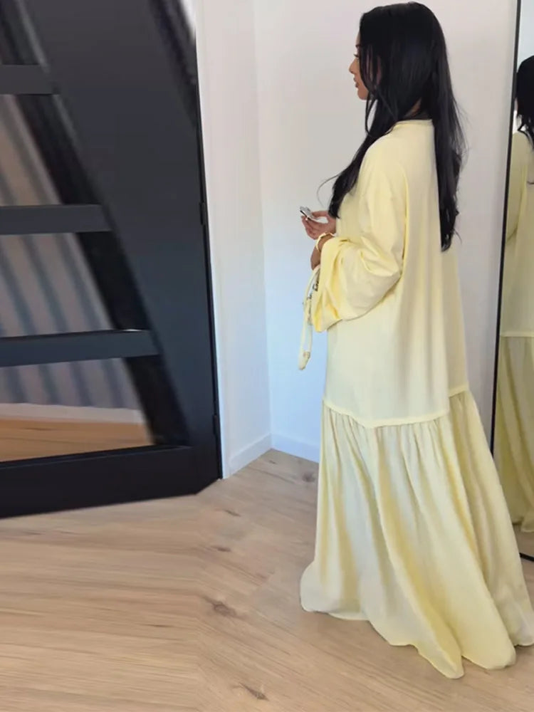 Tiered maxi dress in motion, showing the skirt flow