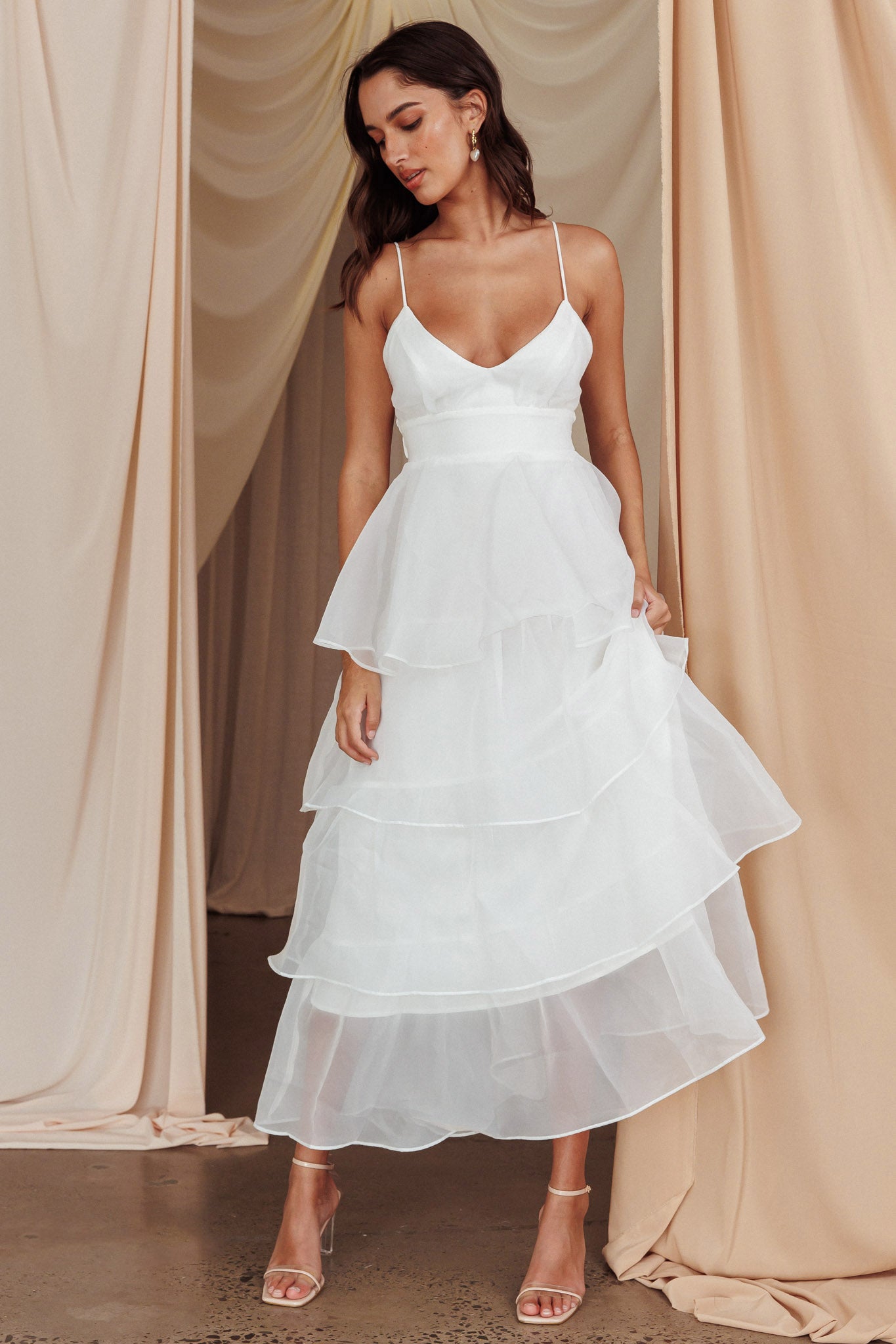 White tiered ruffle midi dress, side view