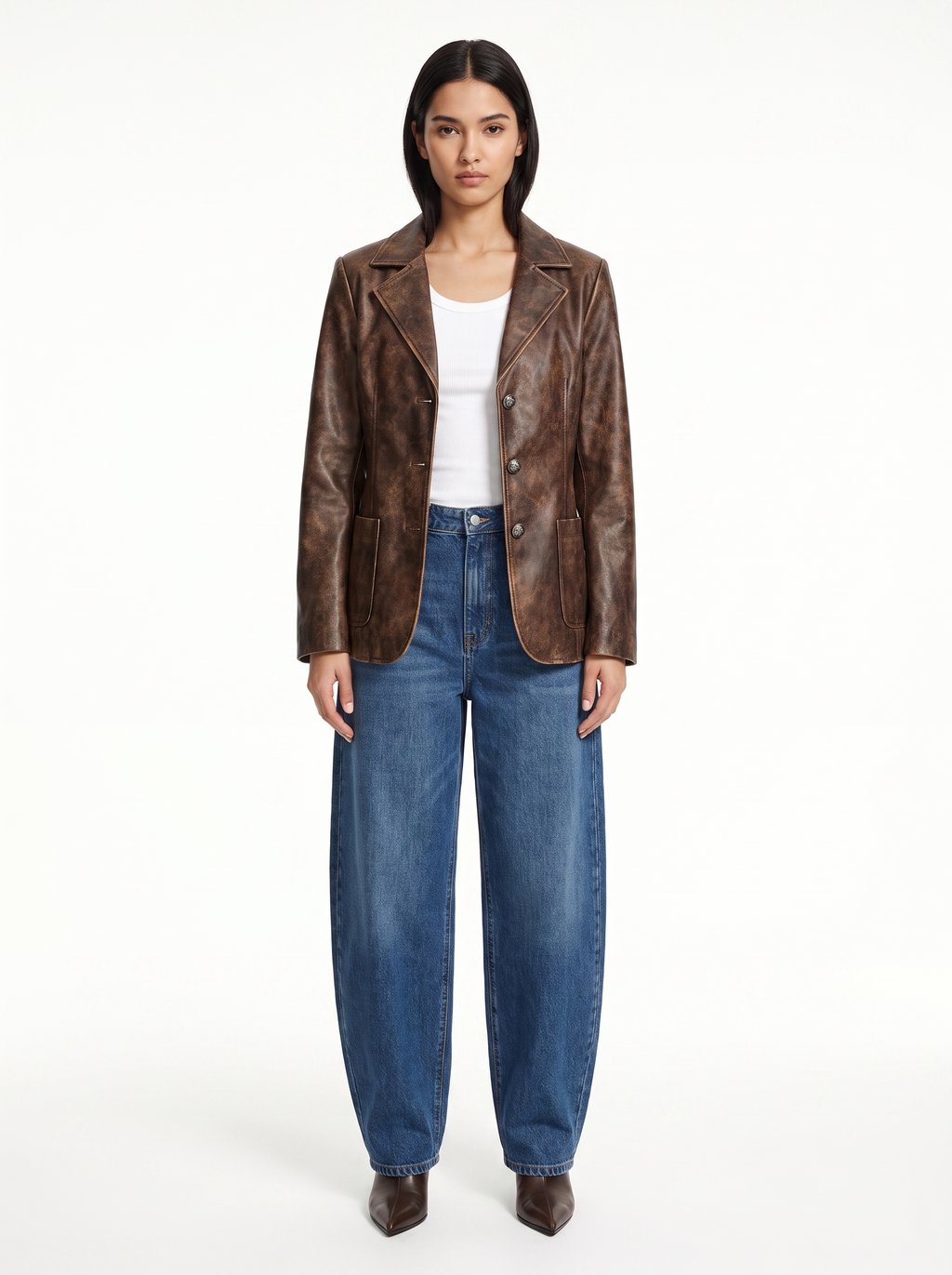 Washed brown faux leather blazer worn by model, front view