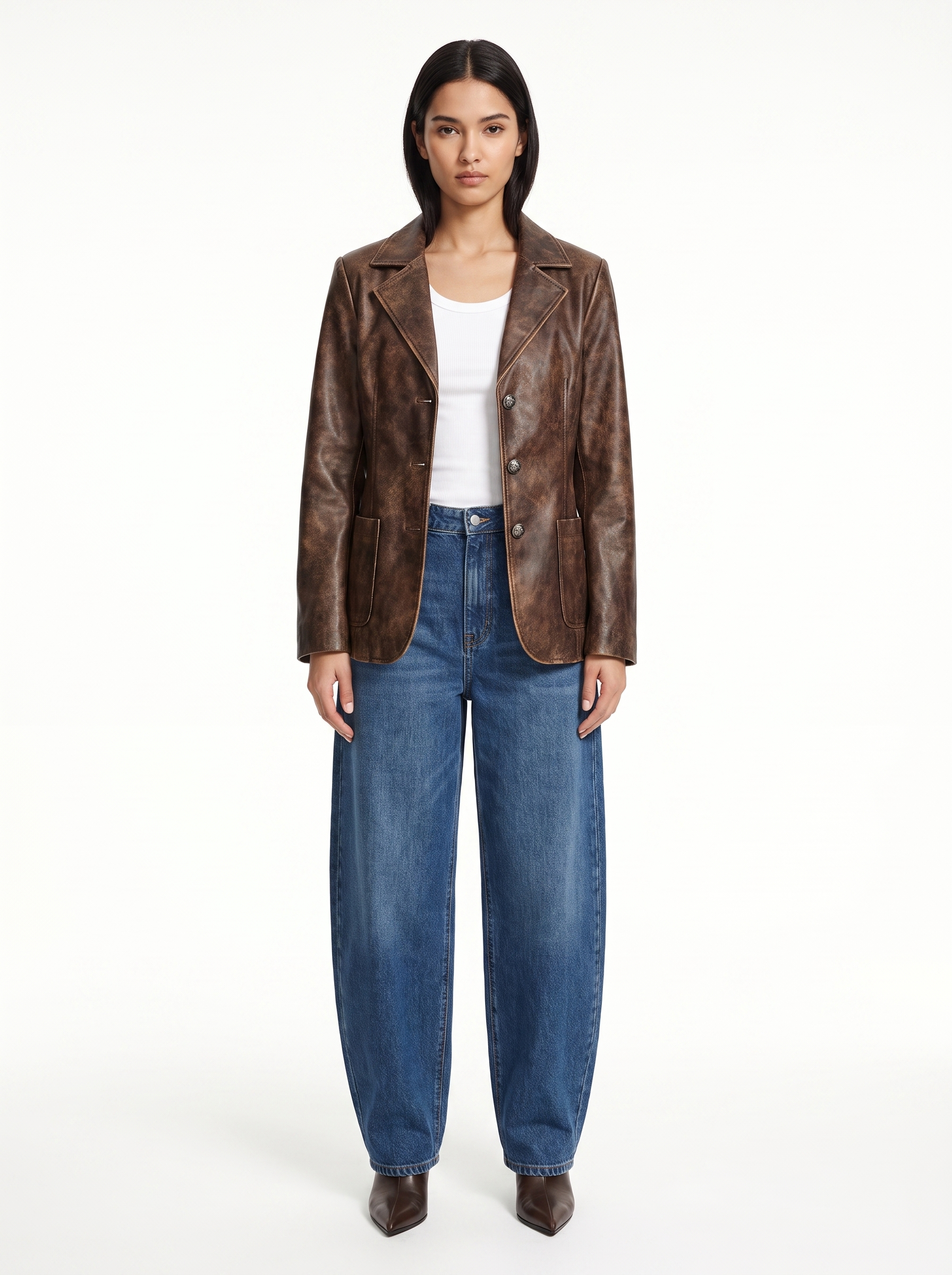 Washed brown faux leather blazer worn by model, front view