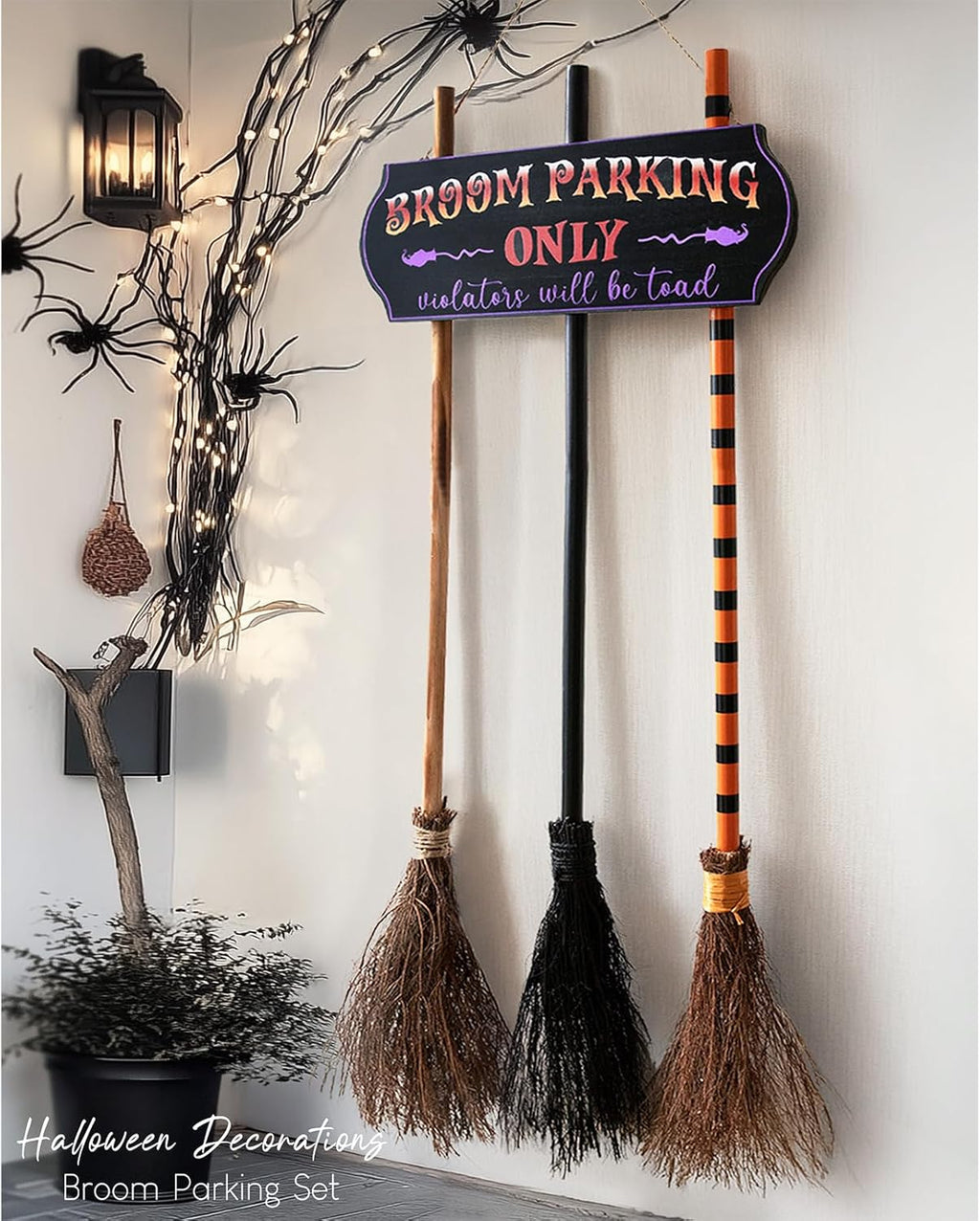 Witch broom parking sign displayed with three wooden brooms