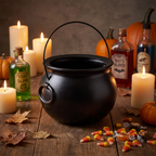 Cauldron bucket filled with candy on a Halloween table