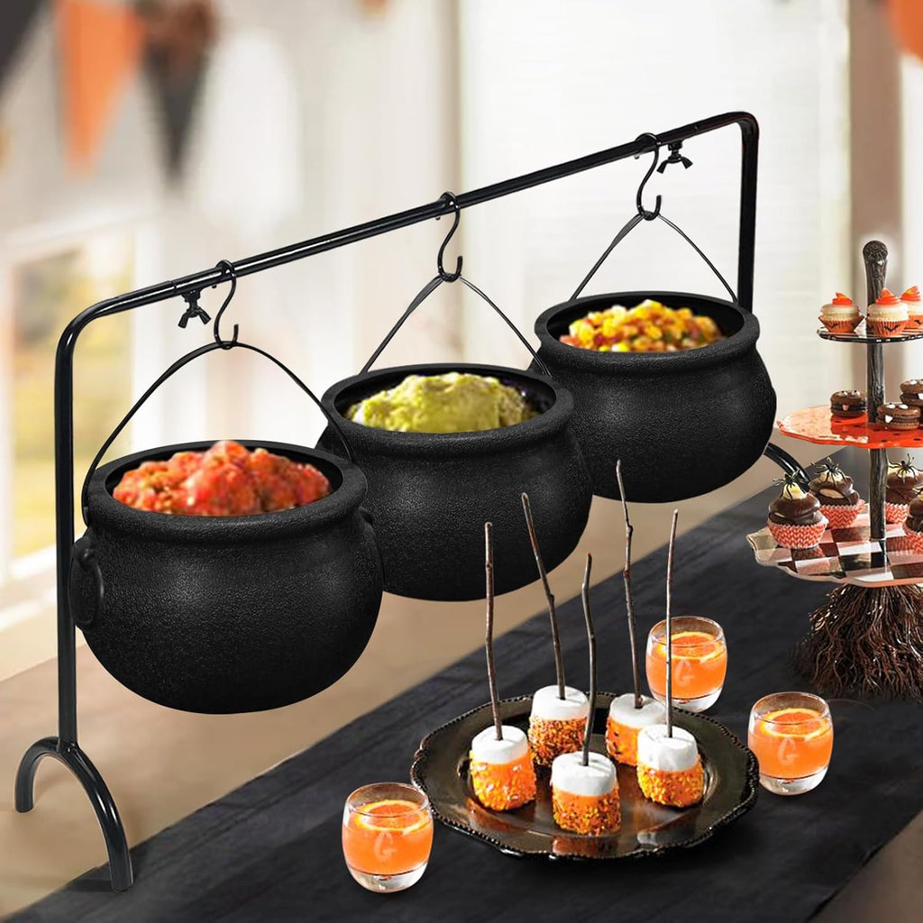 Cauldron bowls set of 3 filled with candy on a party buffet table