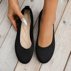 Black slip-on ballet flats with cushioned footbed