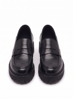 Black platform loafers product shot on white background