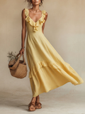 Women's yellow linen maxi dress with ruffle V-neck, front view