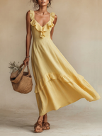 Women's yellow linen maxi dress with ruffle V-neck, front view