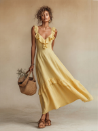 Women's yellow linen maxi dress, styled full-length view