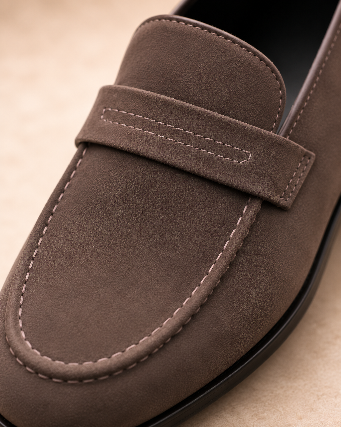 Penny loafers worn with trousers