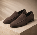 Brown penny loafers, side view