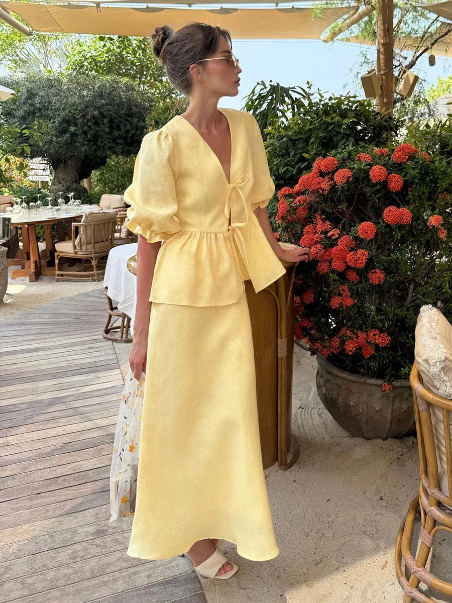 Puff sleeve wrap top and maxi skirt set in yellow, front view