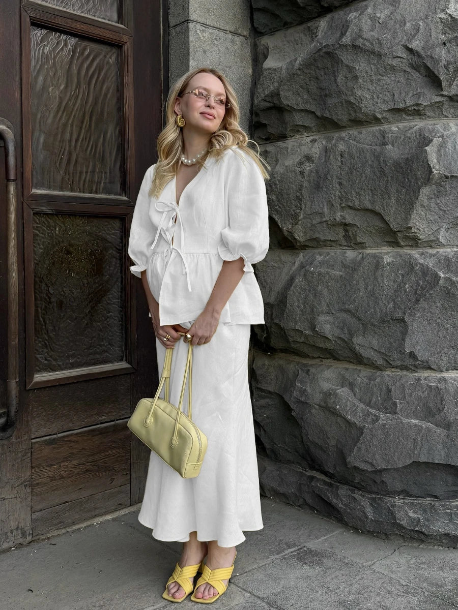 Puff sleeve wrap top and maxi skirt set in white, front view