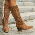 Brown western cowboy mid-calf boots, side view