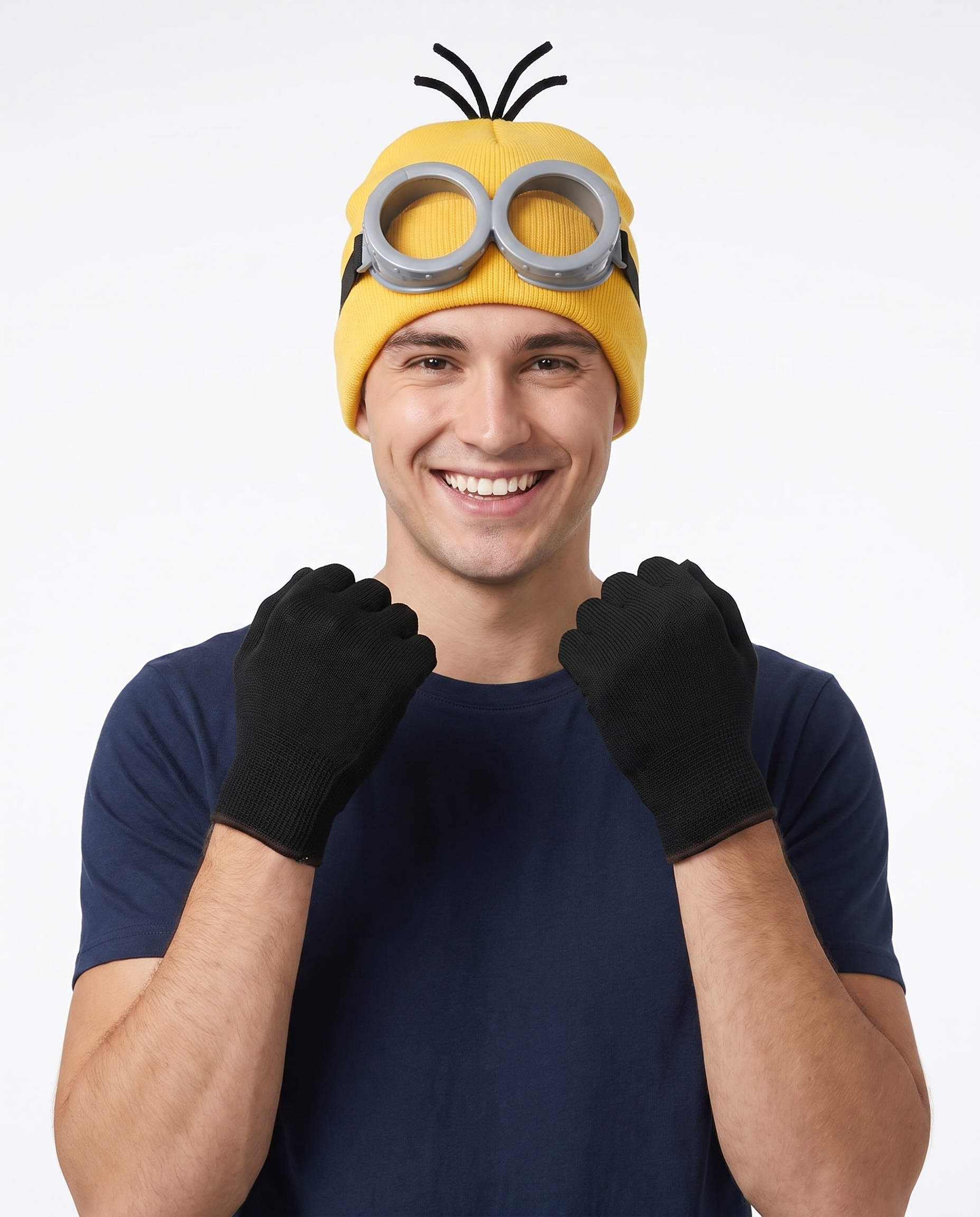 Person wearing the yellow beanie, goggles and gloves
